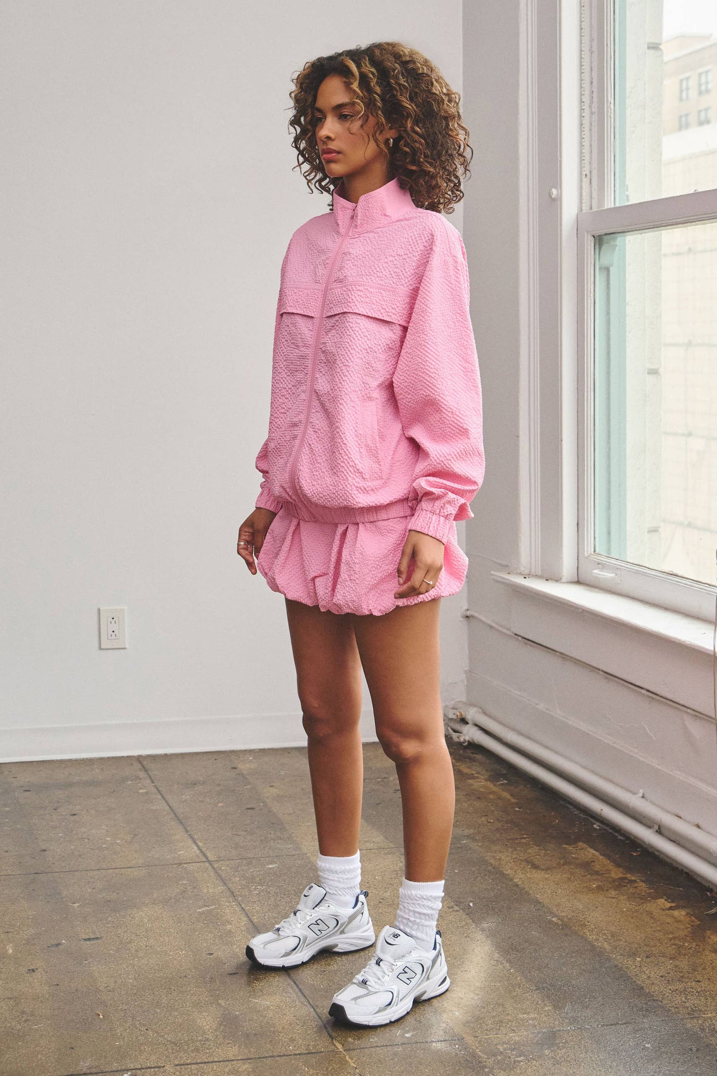 Light textured zip-up jacket w/ bubble skort set